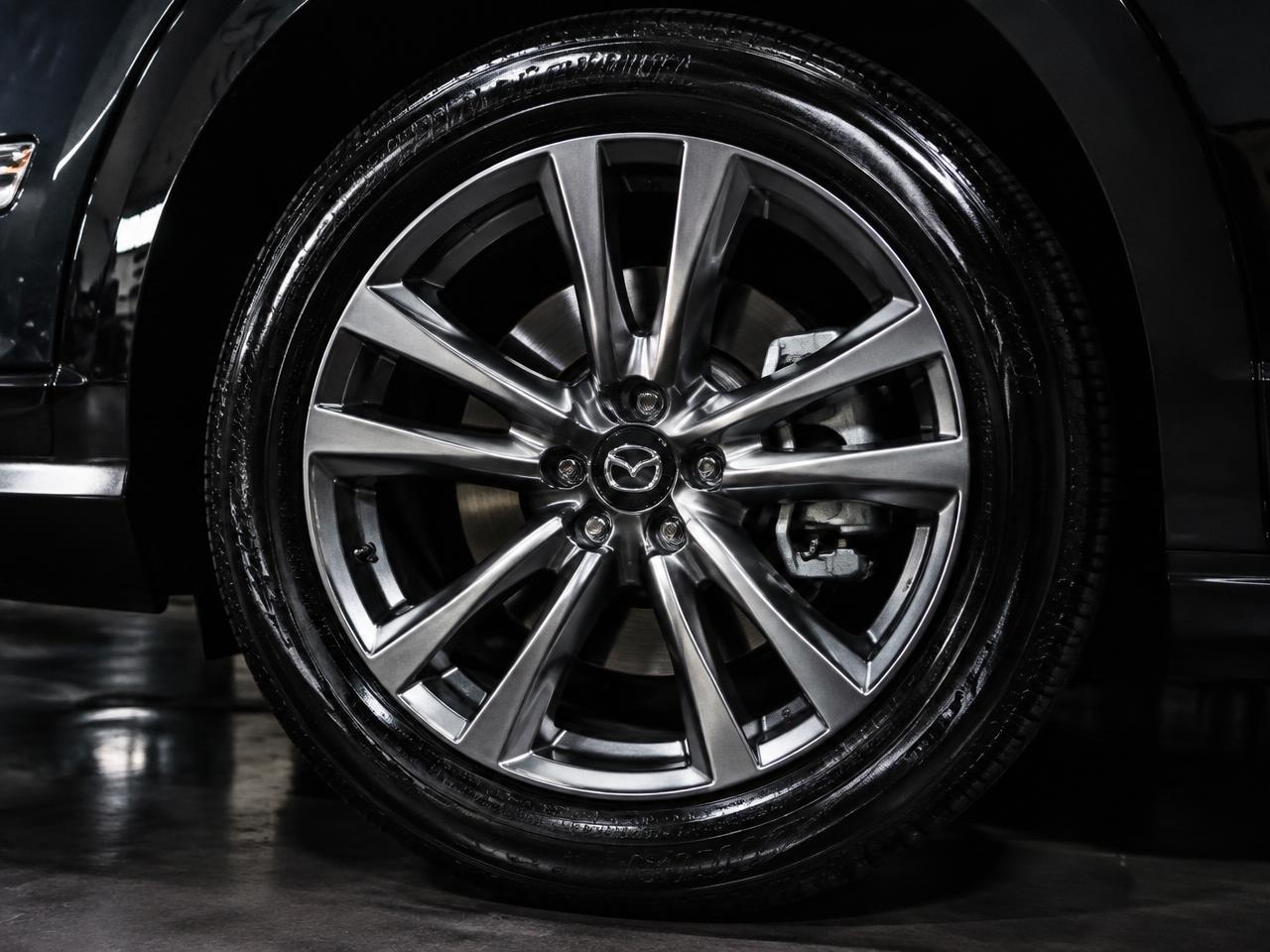 Alloy wheel and tyre cleaned and dressed after a mobile wheel detail